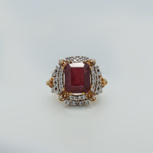 A ring with Ruby and zircons