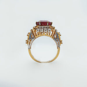 A ring with Ruby and zircons