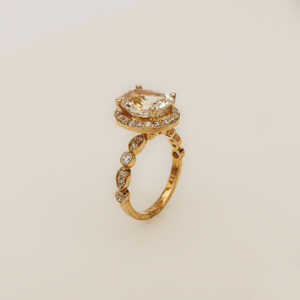 Celestial Glow – 21k Gold Ring with Skardu Topaz & Zircons