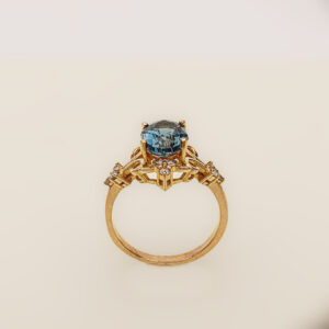 Royal Midnight – 21k Gold Ring with London Blue Topaz & Zircons