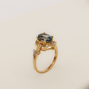 Royal Midnight – 21k Gold Ring with London Blue Topaz & Zircons