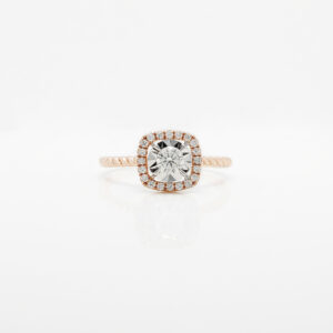 A radiant diamond halo set in luxurious 18K gold
